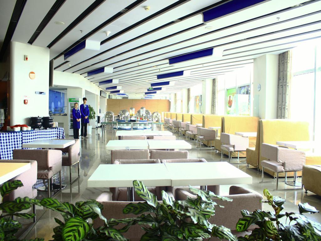 Holiday Inn Express Tianjin Binhai Экстерьер фото